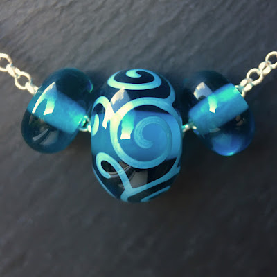 Lampwork glass and sterling silver necklace by Laura Sparling