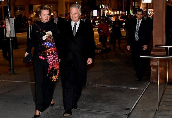 Queen Mathilde wore a floral-print crepe maxi dress by Dries van Noten. King Philippe and Queen Mathilde attended the briefing