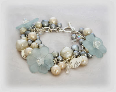 White & ice blue floral charm bracelet with tiny little silver bird charms handmade by Lottie Of London