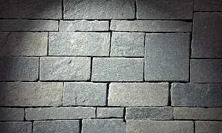 brick wall paper in bedroom 