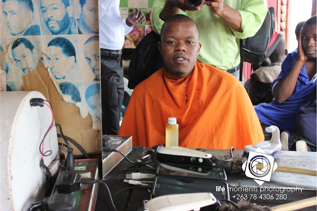 Picture By Life Moments Media. Tonderai Gondwa undergoing hair grooming and cut before his wedding.