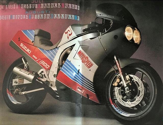 Mid '80s custom Suzuki GSXR Slab Side with matte black paint and red, white and blue speed stripes.