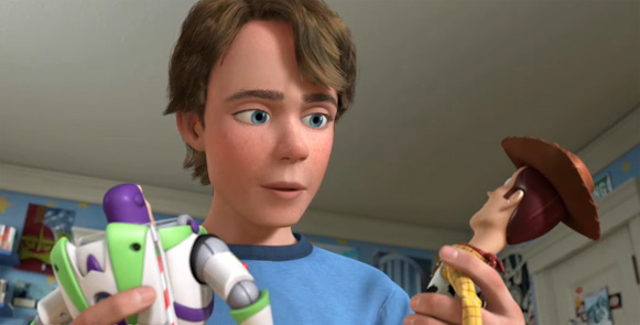 Andy holding Buzz and Woody Toy Story 3 2010 animatedfilmreviews.filminspector.com