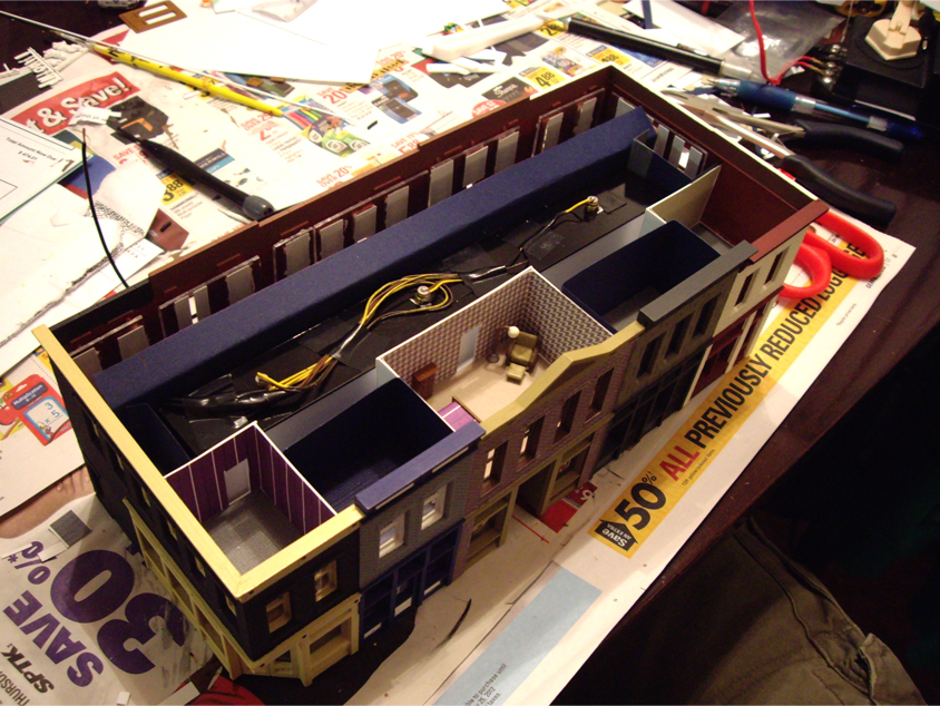 Custom built interior rooms and light diffuser made from styrene and cardstock for the second floor of a Merchant’s Row 1 kit