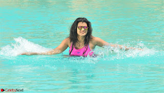Hebah Patel in swimsuit in a simming pool glam pics 5