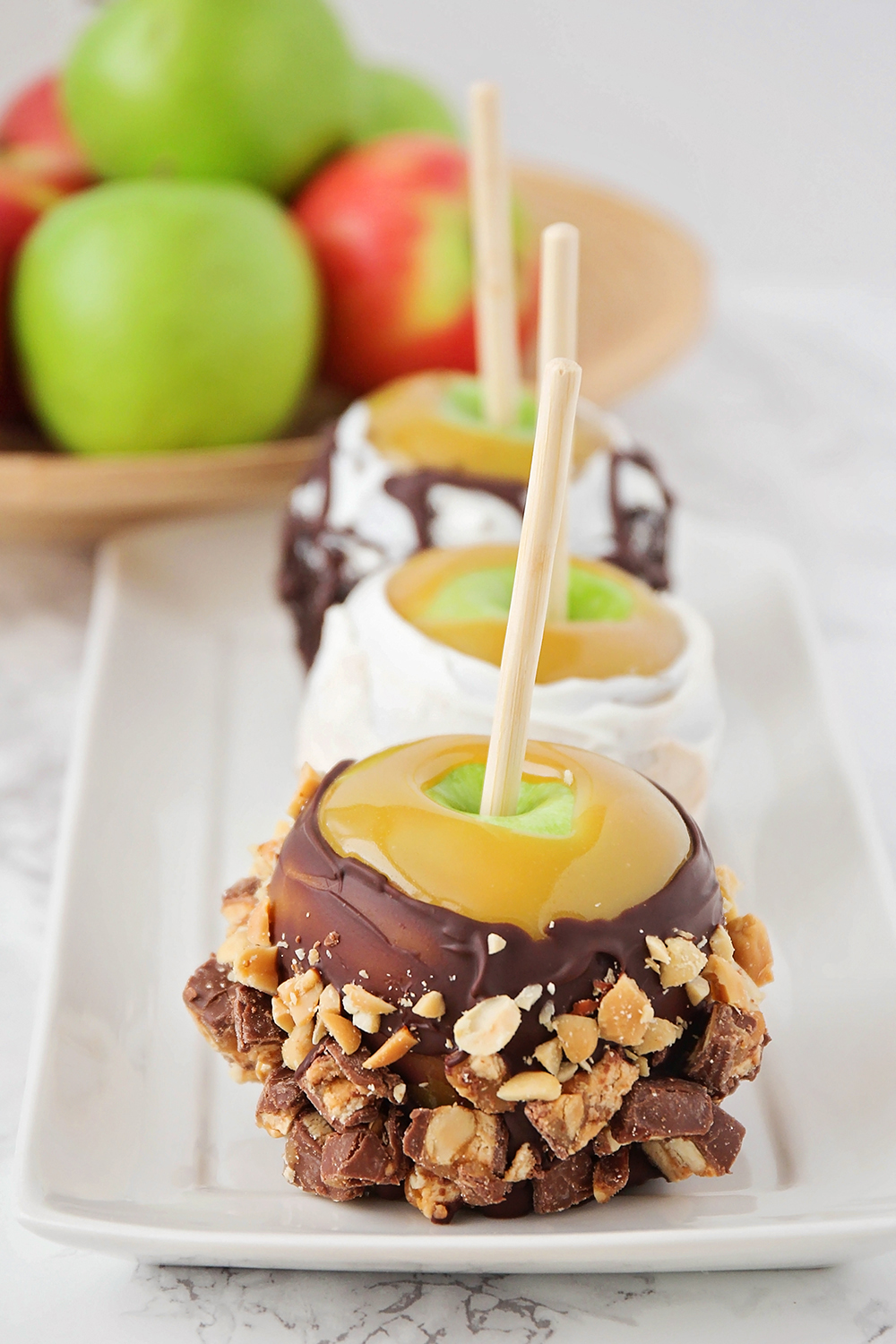 These gourmet caramel apples are made with the best homemade caramel, and taste just like the ones from the candy shop!