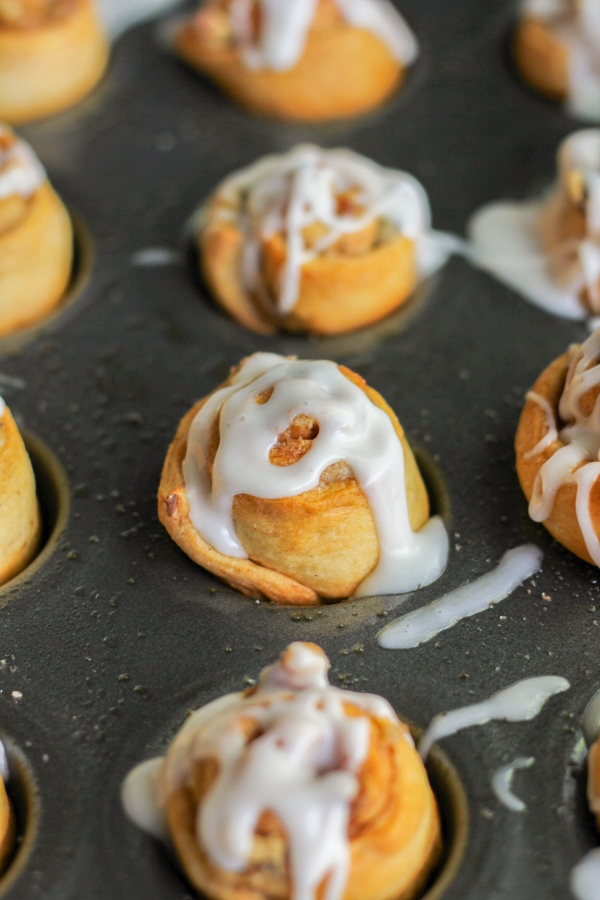 These bite-sized Mini Walnut Cinnamon Buns call for a just a few ingredients and are ready to eat in just 30 minutes! They are perfect for a holiday breakfast or brunch, or just because.