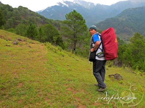 A mountaineer walking the initial Akiki trail going to Mt. Pulag