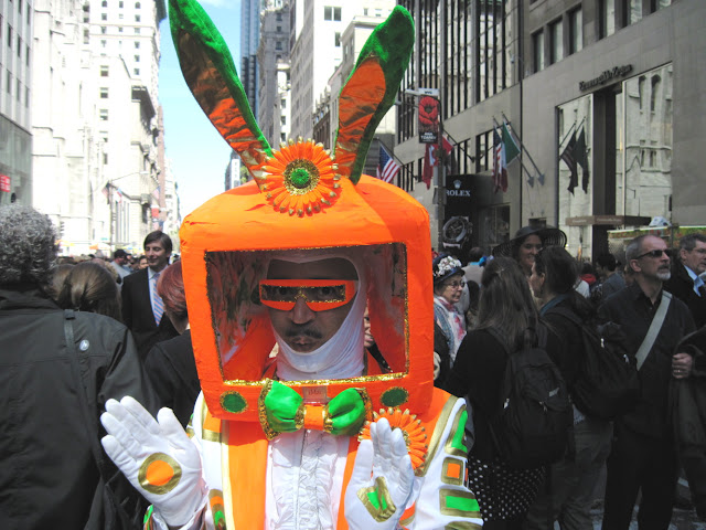 Old in New York the Easter Parade may be, but some of the costumes are truly out of this world
