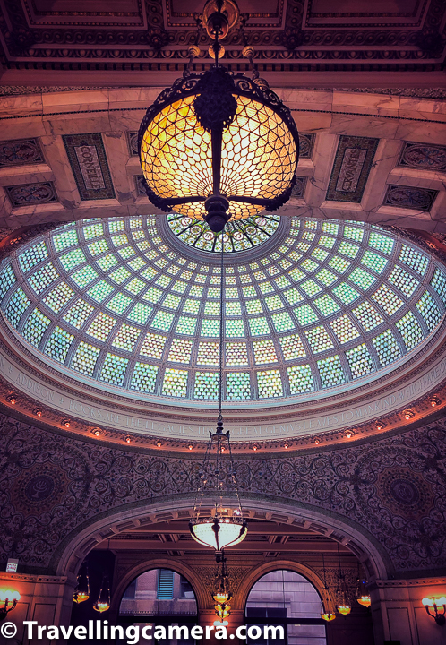 Tiffany glass dome of Chicago Cultural Center is very popular and supposedly the largest one in the world. Above photograph shows ornately patterned room of curving white Carrara marble, capped with an 38 feet Tiffany glass dome. The Cultural Center states this to be the largest Tiffany dome in the world.