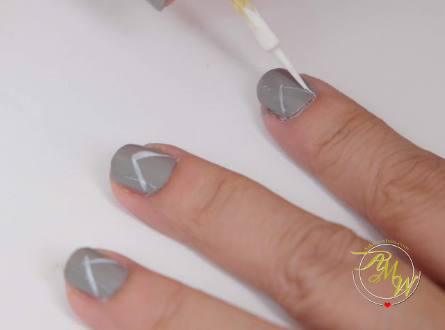 a photo of Nail Art tutorial, space gray nails by Nikki Tiu of www.askmewhats.com