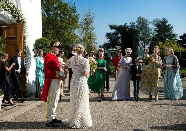 Princess Alexandra is wearing the Ahlefeldt-Laurvig-Bille floral tiara, wedding lace dress. Princess Nathalie and Princess Sumaya