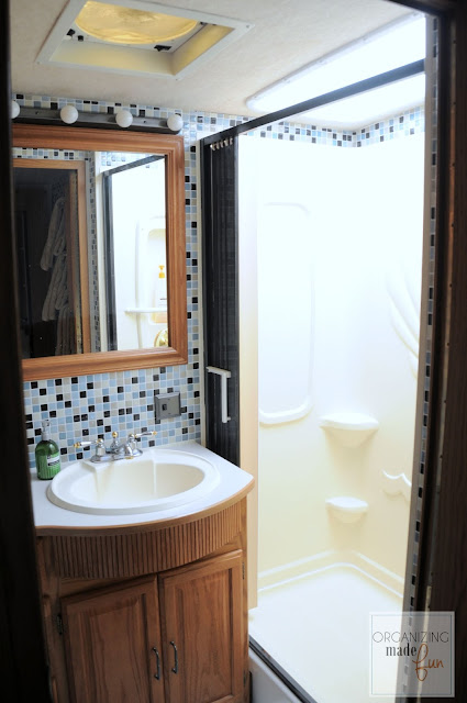 Updated RV bathroom with tile and shower painted in oil rubbed  bronze :: OrganizingMadeFun.com