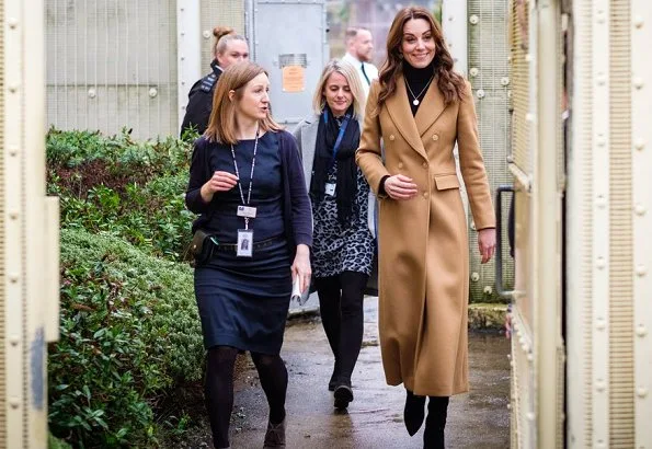 Kate Middleton wore massimo dutti cashmere wool camel coat. Kate Middleton wore Zara animal print skirt at Ely and Careau Children's Centre