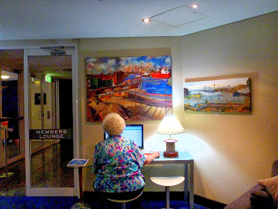 exhibition of Pyrmont paintings by industrial heritage artist Jane Bennett in the members lounge of the Australian National Maritime Museum