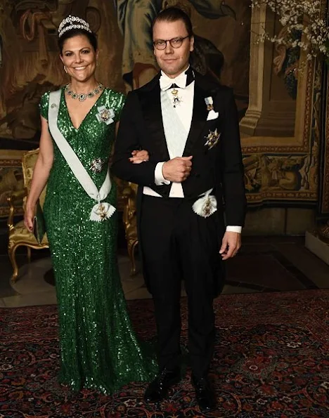 Crown Princess Victoria wore Green gown and Anya Hindmarch Gold Metallic Clutch Princess Sofia wore red gown and  silver diamond Metallic Clutch, diamond tiara.