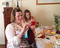 hens sewing purses during the craft workshop