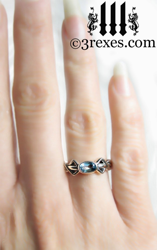 silver pixie friendship ring with celtic blue topaz