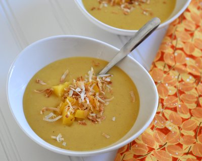 Butternut Squash Soup with Mango & Toasted Coconut, another easy vegan summer salad ♥ AVeggieVenture.com, a smooth almost custard-like soup, served chilled on warm days or warm on chilly days. Beautiful Color. Great for Meal Prep.