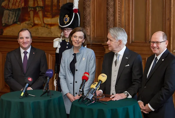 wedens King Carl Gustaf, flanked by Crown Princess Victoria, gestures during a cabinet meeting at the Royal Palace in Stockholm 