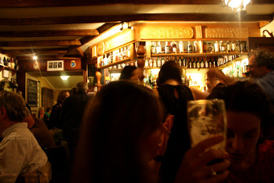bustling atmosphere in the bar - The Port Charlotte Hotel and Bar, Islay, Scotland