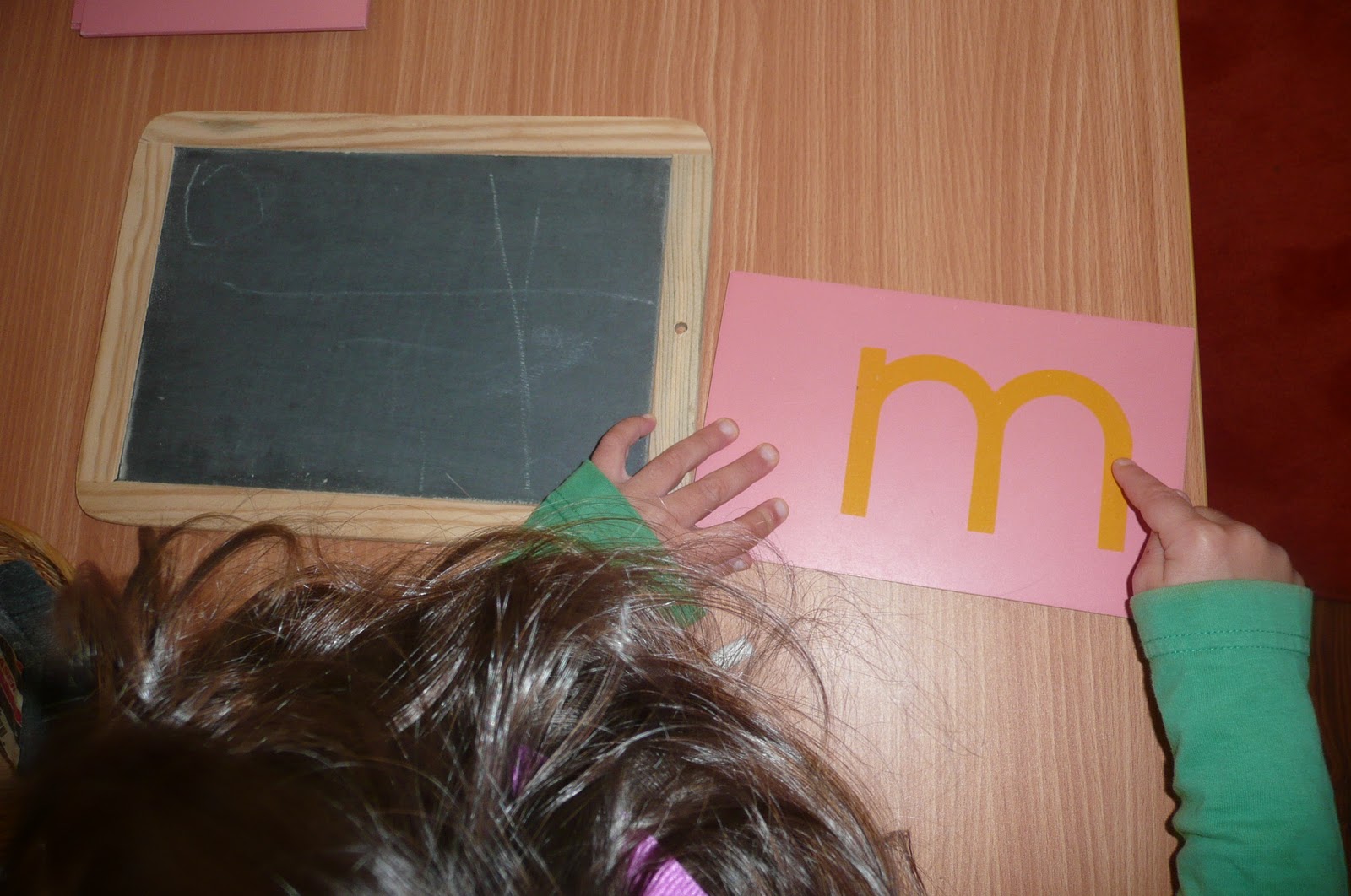 Montessori Teachings Writing on the Chalkboard