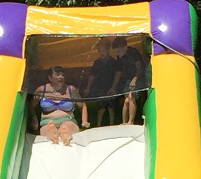#myswimbody sliding down the inflatable water slide with the kids