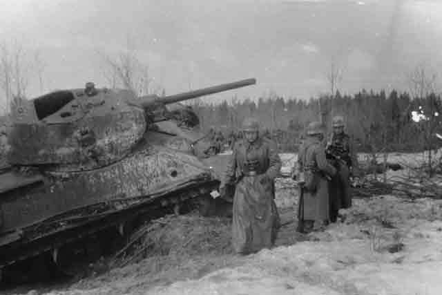 Knocked-out T-34 tank at Tikhvin, 8 November 1941 worldwartwo.filminspector.com