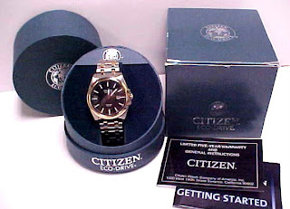 CITIZEN ECO-DRIVE SAPPHIRE WR100 GOLD TONE TRIM STAINLESS STEEL SPORT
