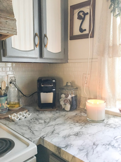Counter top makeover with marble contact paper
