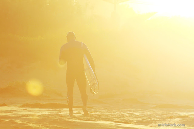 surfer surfing waves at geringong beach sydney australia