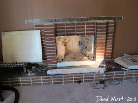 put insulation in fireplace to save heat