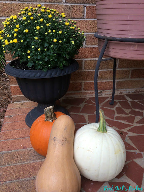 Decorate your front porch for fall with pumpkins and mums