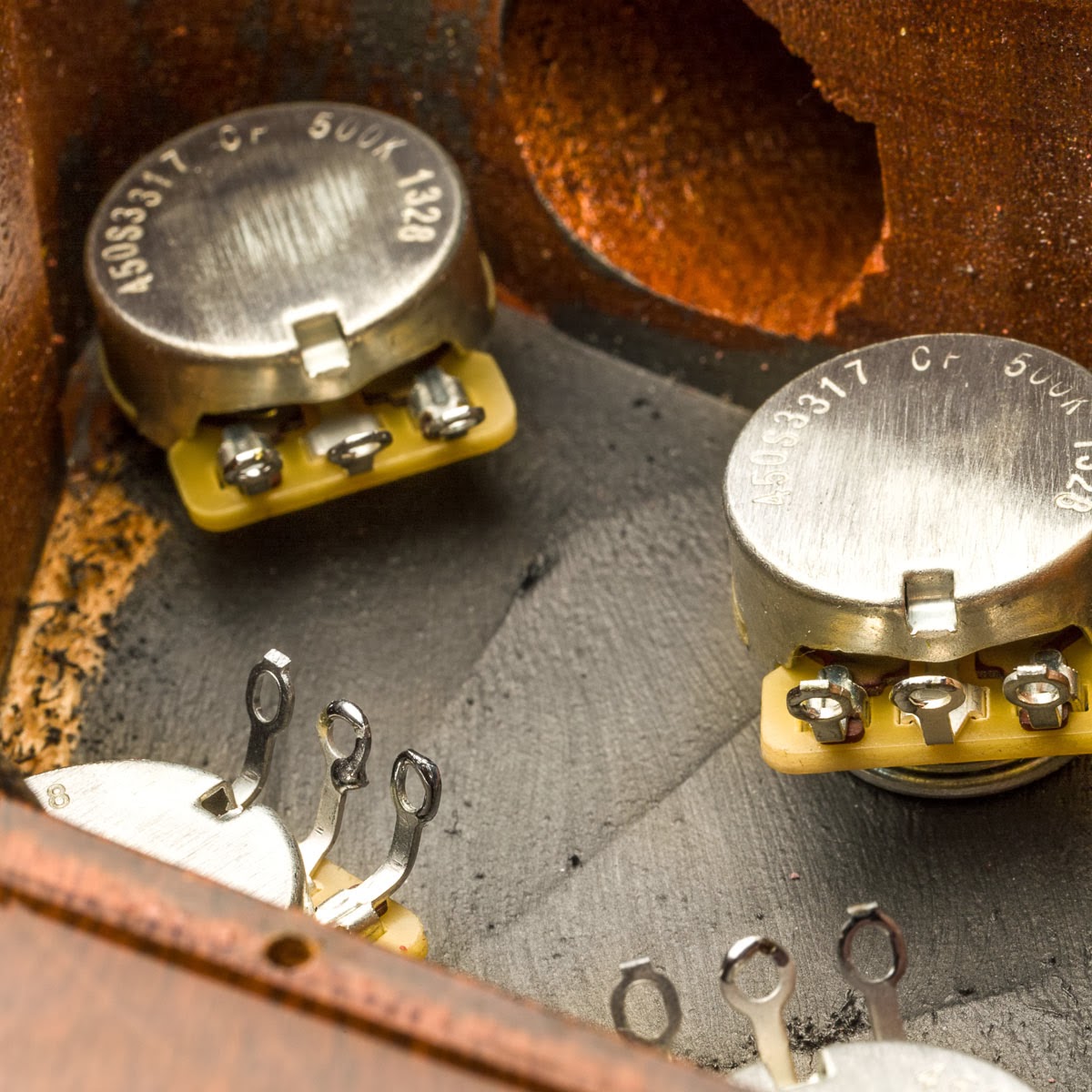 A regular Les Paul soldering job involves very little work that you can do outside the control cavity. Apart from the caps and ground wire all else has to ...