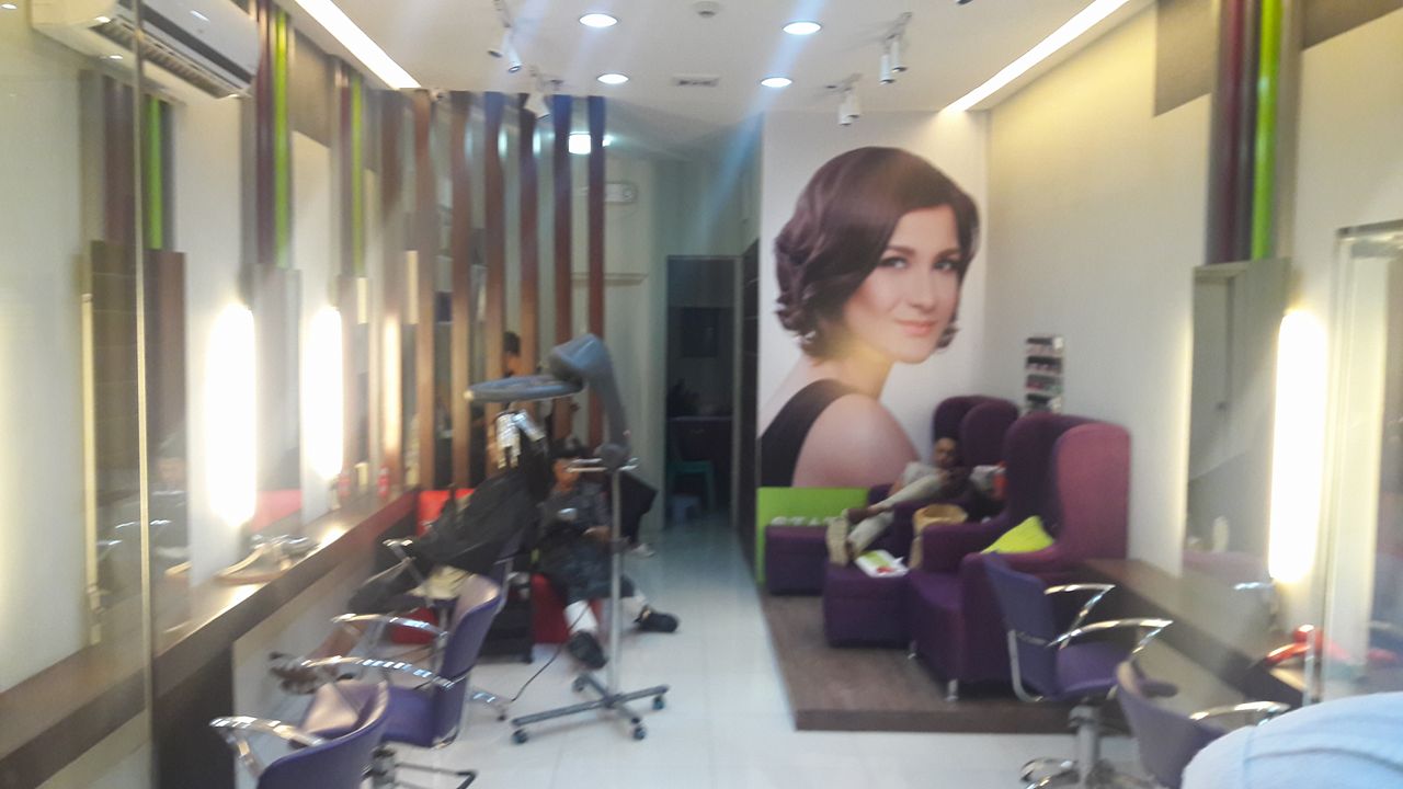 I love my new hair color by Status Hair Salon!