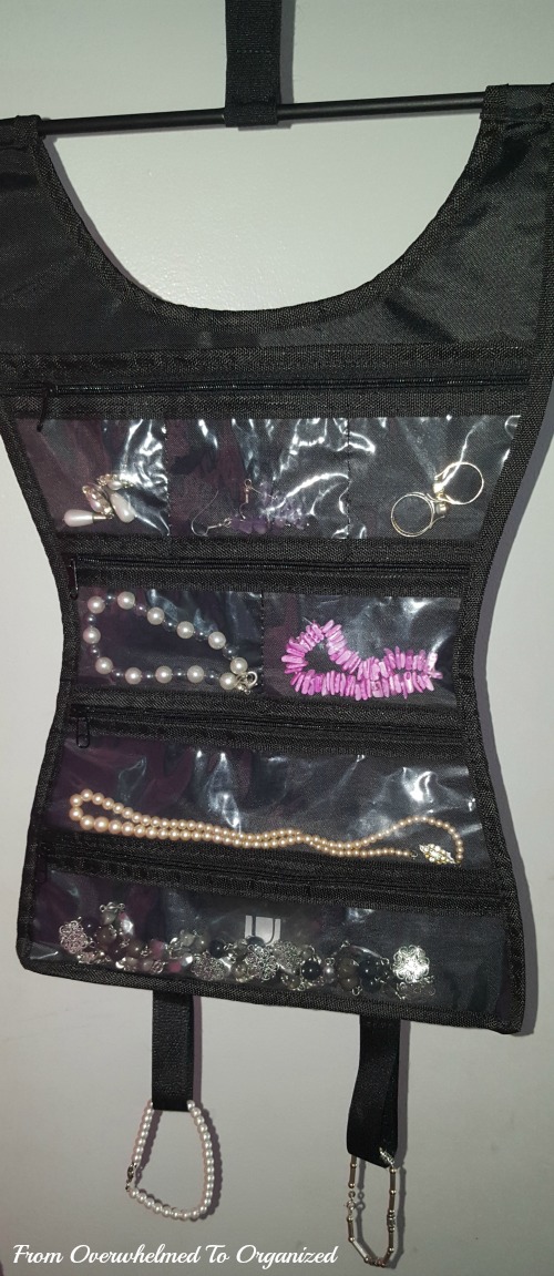 From overwhelmed to organized. Hanging jewelry organizer.