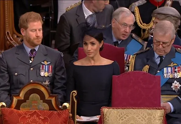 Countess Sophie wore Suzannah Wave Textured Stripe Dress, Meghan Markle wore Dior navy fit and flare dress with bateau neckline. Kate Middleton