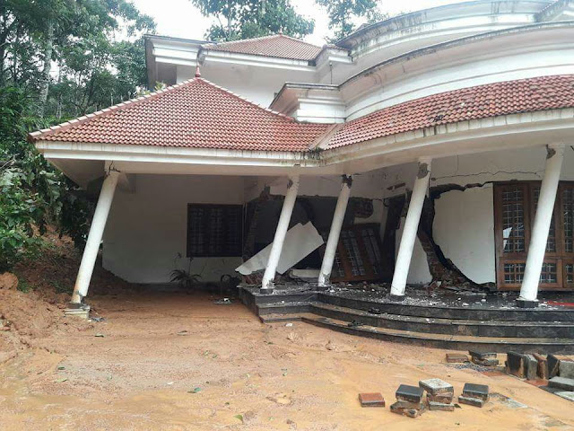 kerala flood damage,flood damaged house in kerala, idukki due to soil piping