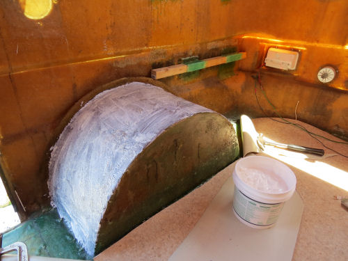 covering the wheel well in a fiberglass trailer