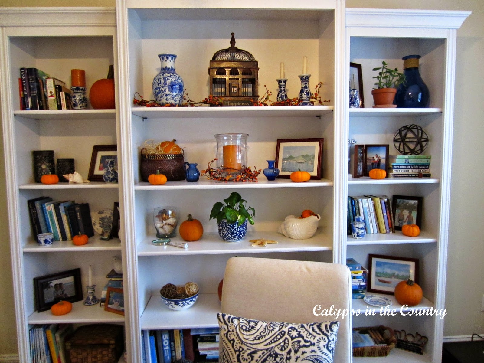 White bookcases decorated for fall White bookcases decorated for fall