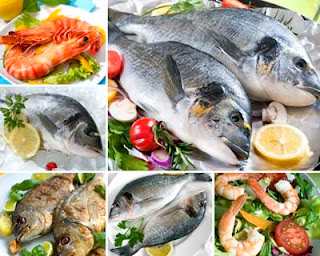 Fotos de pescado cocinado y mariscos con ensaladas