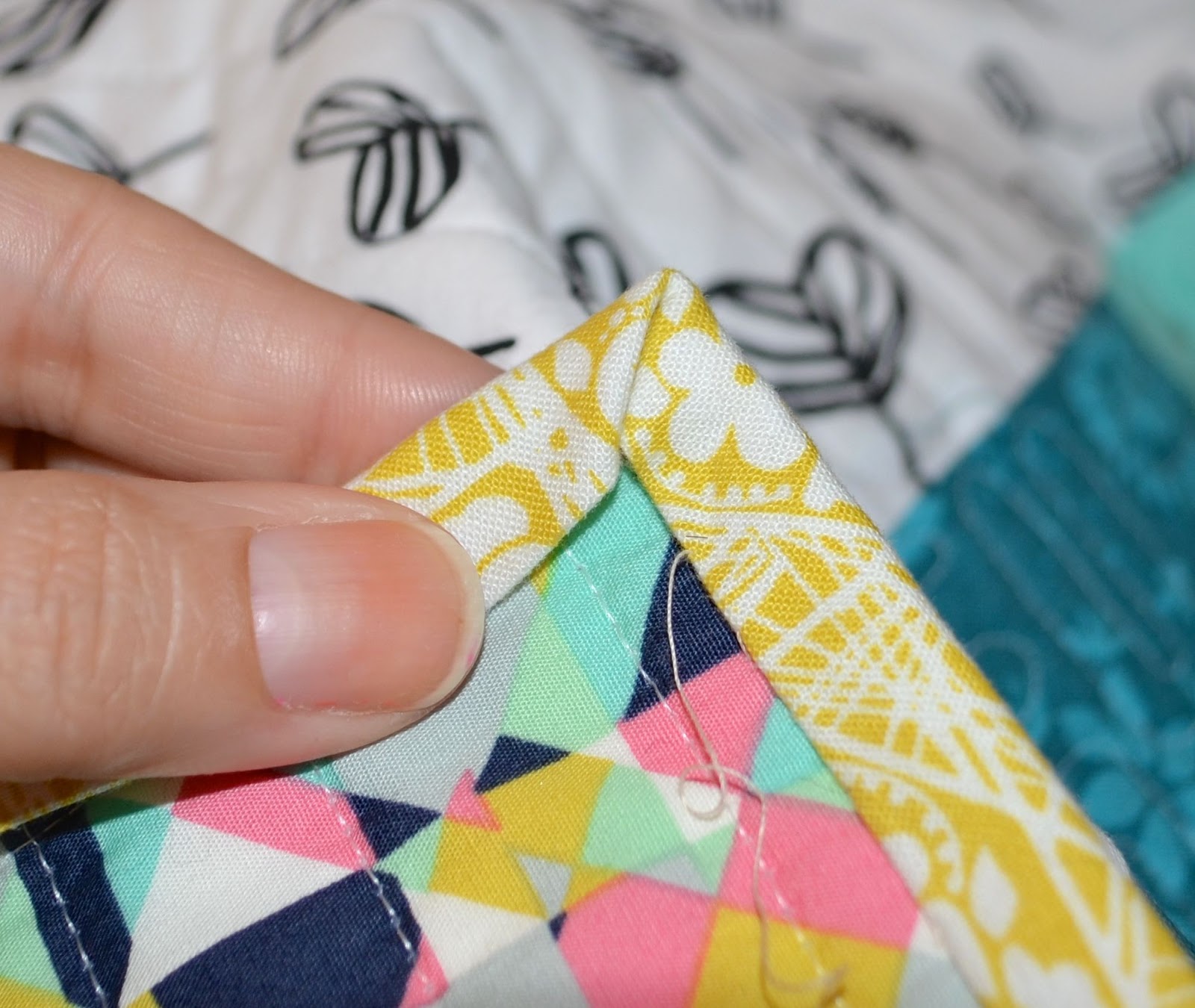 she can quilt Quilt Binding Tutorial hand and machine stitched