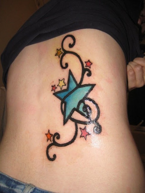 Tatuaje estrellas de colores