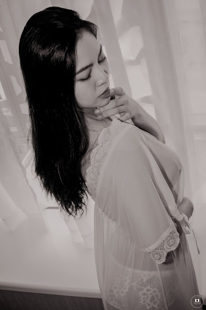 Sexy Asian Girl Sitting By The Window 29
