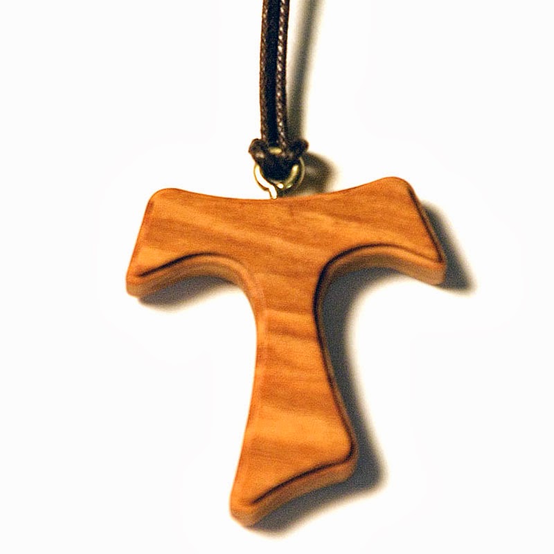 AMARE ET SERVIRE The TAU Cross