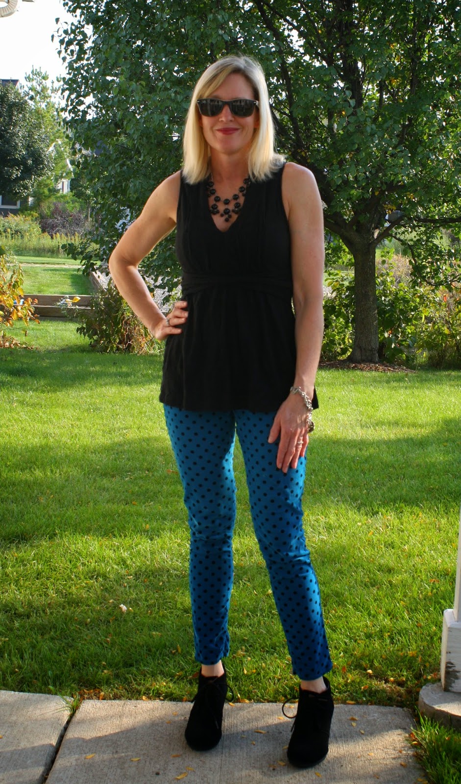 black peplum tank top with blue polka dot courdorys