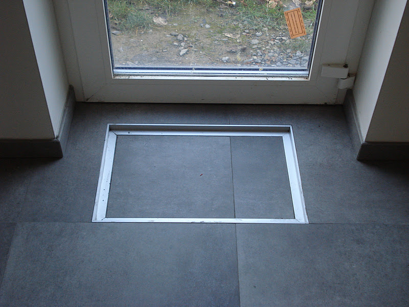 Notre construction très basse energie à SarslaBuissière Le carrelage est terminé..