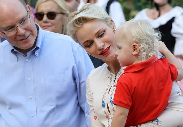 Prince Albert, Princess Charlene attend a dance show with Prince Jacques, the heir apparent to the Monegasque throne during the traditional Monaco's picnic - Pique Nique Monegasque at Le Parc Princesse Antoinette