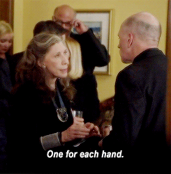 Gif Grace and Frankie whiskey sours one for each hand