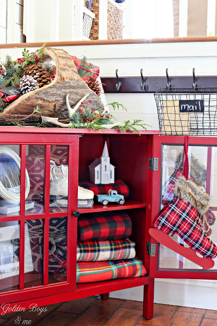 Christmas Entryway with red Target bookcase, plaid and evergreen basket from Joss and Main - www.goldeboysandme.com